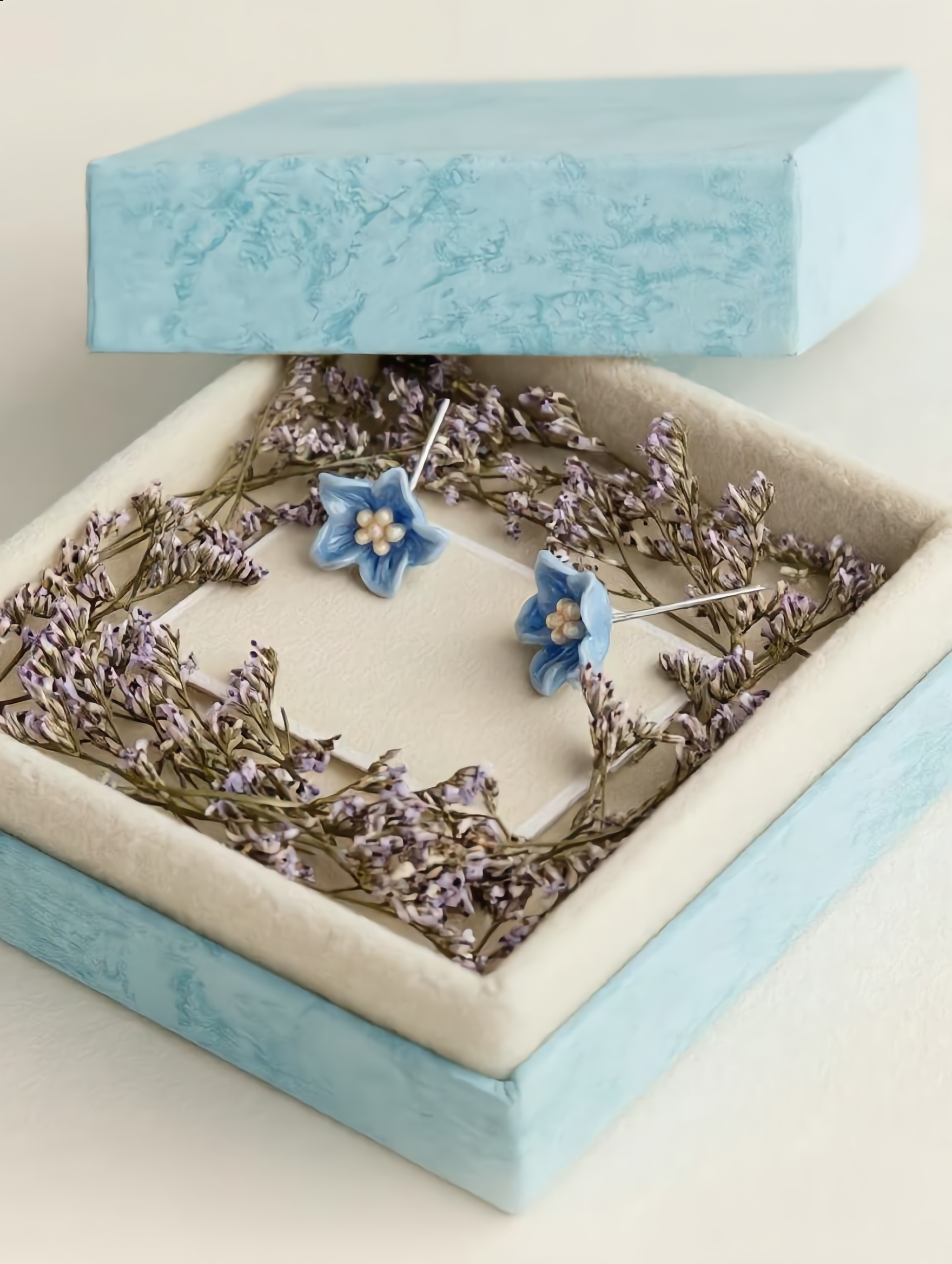 Mikit Petite Azure Bloom Studs: A Touch of Gentle Color